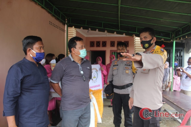 Berikan Bantuan Kepada Korban Banjir,Camat Simpang Empat Sambut Kedatangan Kapolres Asahan