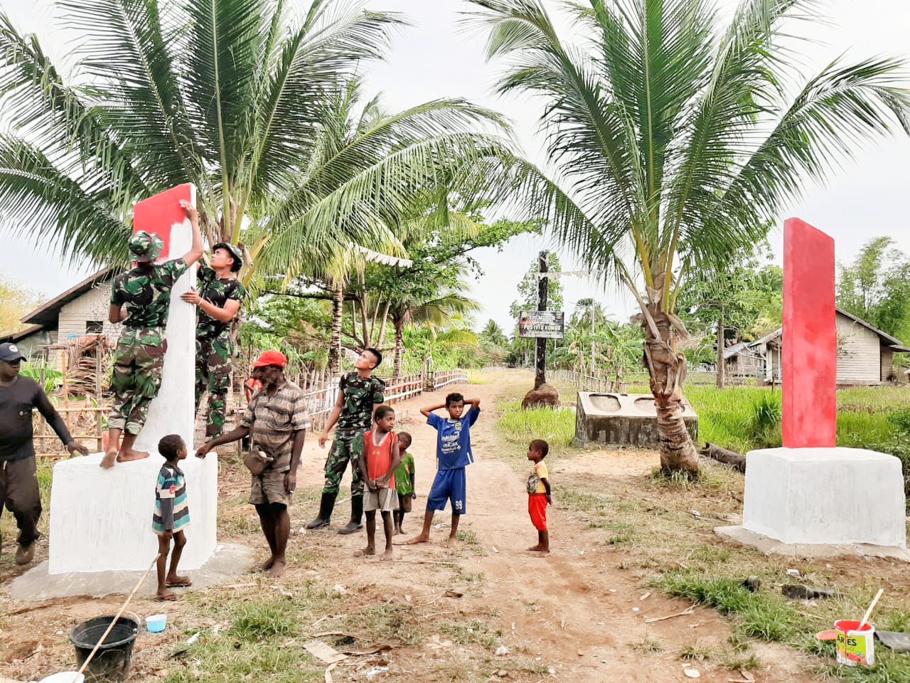 Satgas Pamtas RI-PNG YonifMR 411 / Pdw Kostrad Sulap Gapura Kampung Kondo