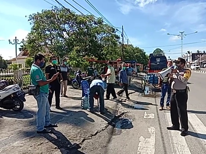 Wartawan, LSM dan Binmas Polres Rohul Ajak Masyarakat Putus Mata Rantai Covid-19 