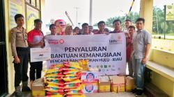 JNE Indonesia, khususnya JNE Pekanbaru Berikan Bantuan untuk Warga Korban Banjir di Rohul