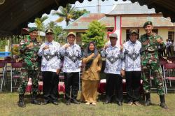 Personel Satgas Yonif 411 Kostrad Hadiri Upacara HUT ke-74 PGRI dan Hari Guru Nasional di Perbatasan