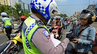 Operasi Zebra Muara Takus 2018 di Persimpangan Ahmad Yani-Juanda, Satlantas Keluarkan 30 Surat Tilan